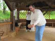 Playing an ancient bowling game on a historical farm in Germany.
